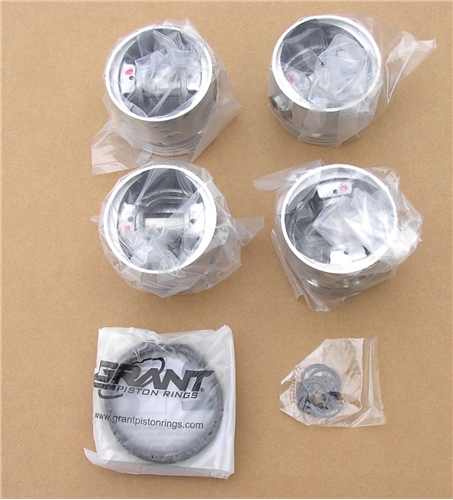 93j) PISTON SET 9.0-1 includes piston rings .060 will fit all 1500
